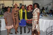 Women in traditional regalia attending Awards